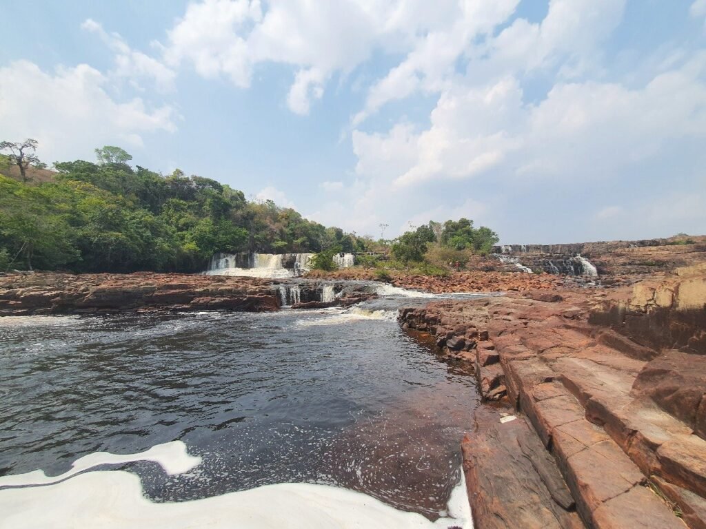Scenic view of Orinduik Falls natural pools