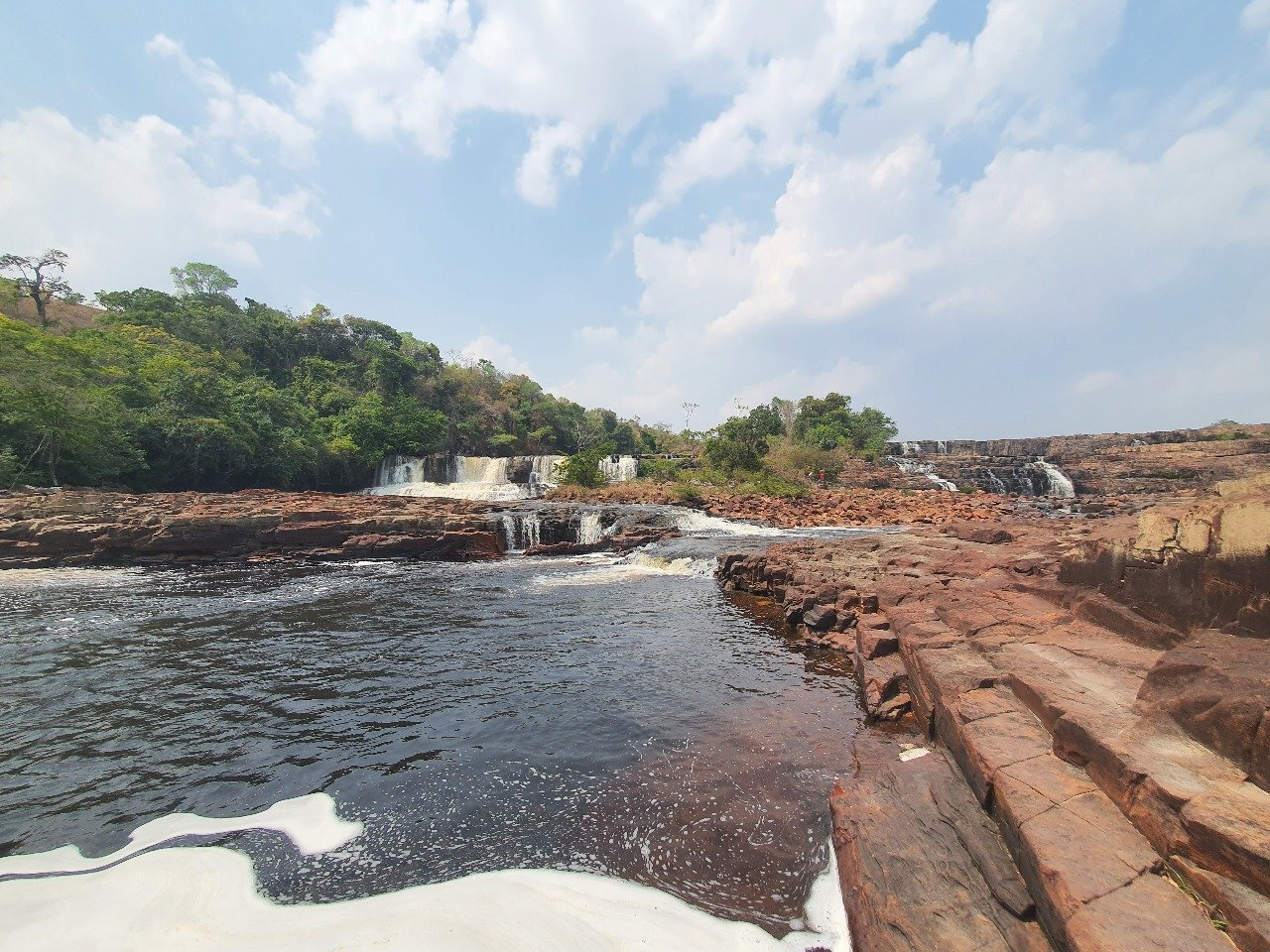 Scenic view of Orinduik Falls natural pools